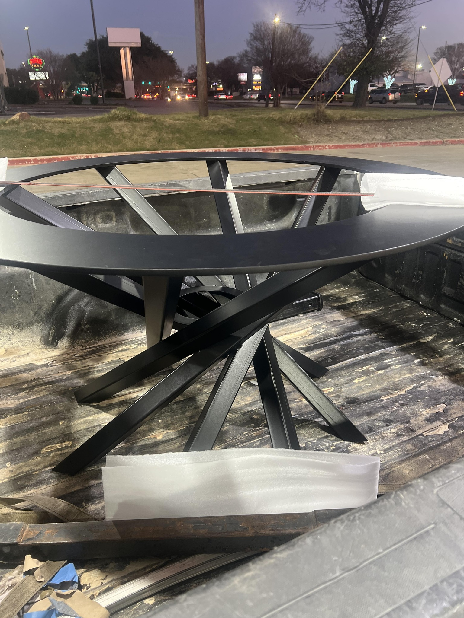 Custom metal table with sculptural base